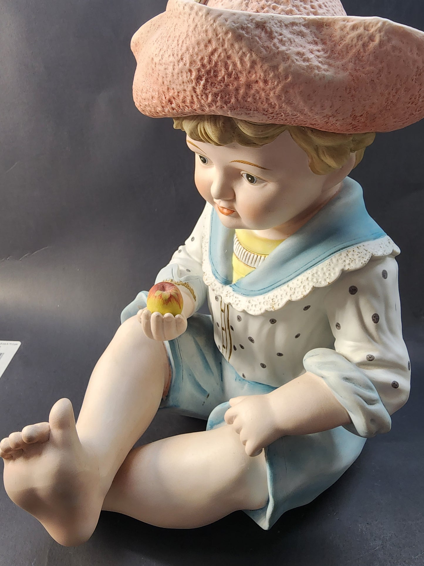Hand painted bisque Porcelain piano doll