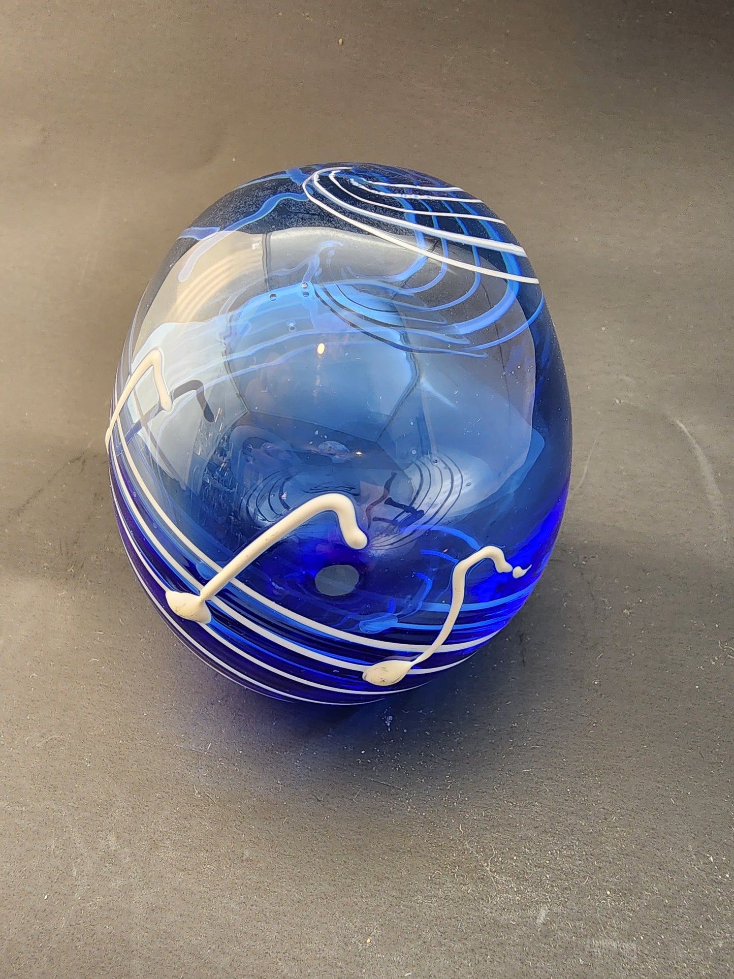 Musical Art glass blue paperweight hollow