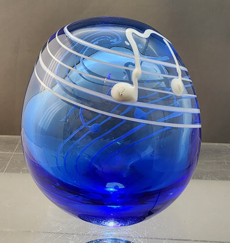 Musical Art glass blue paperweight hollow