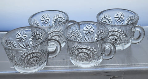 L E Smith Glass bussstar punch cup set of 4 pieces a Auction