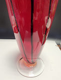 Red glass vase stripes