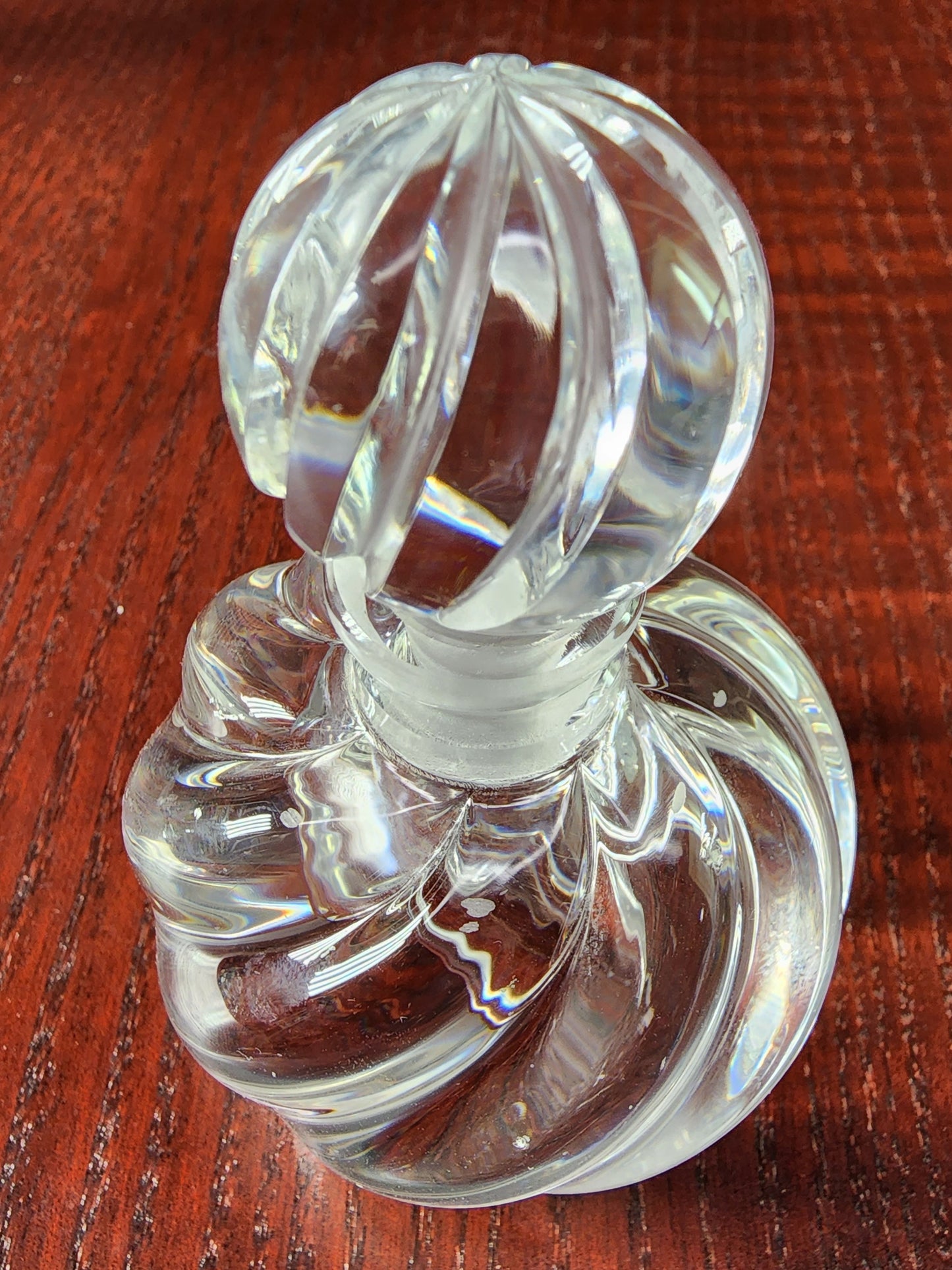 Glass perfume bottle swirl