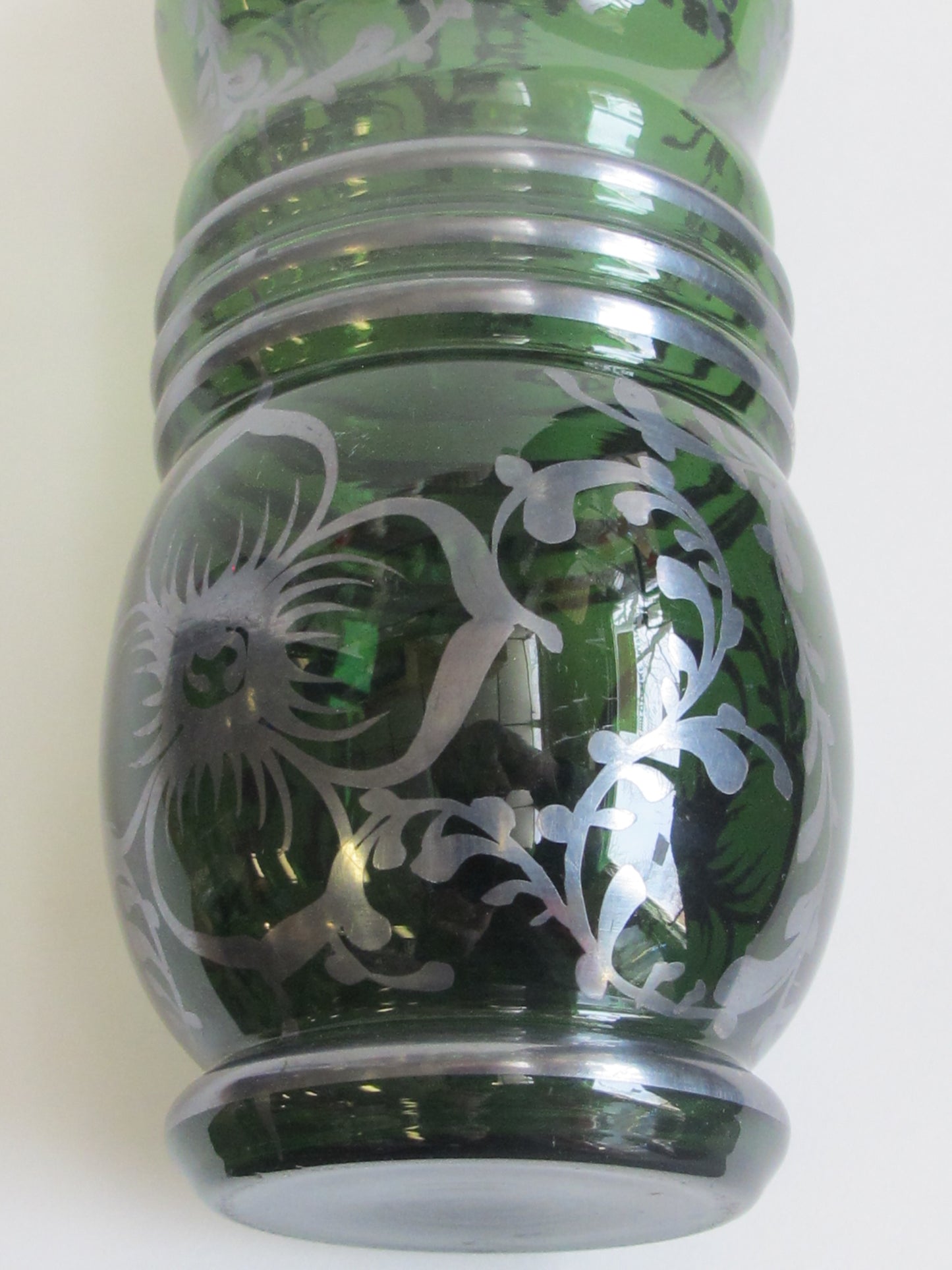 Green glass vase silver underlay