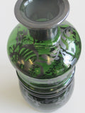 Green glass vase silver underlay