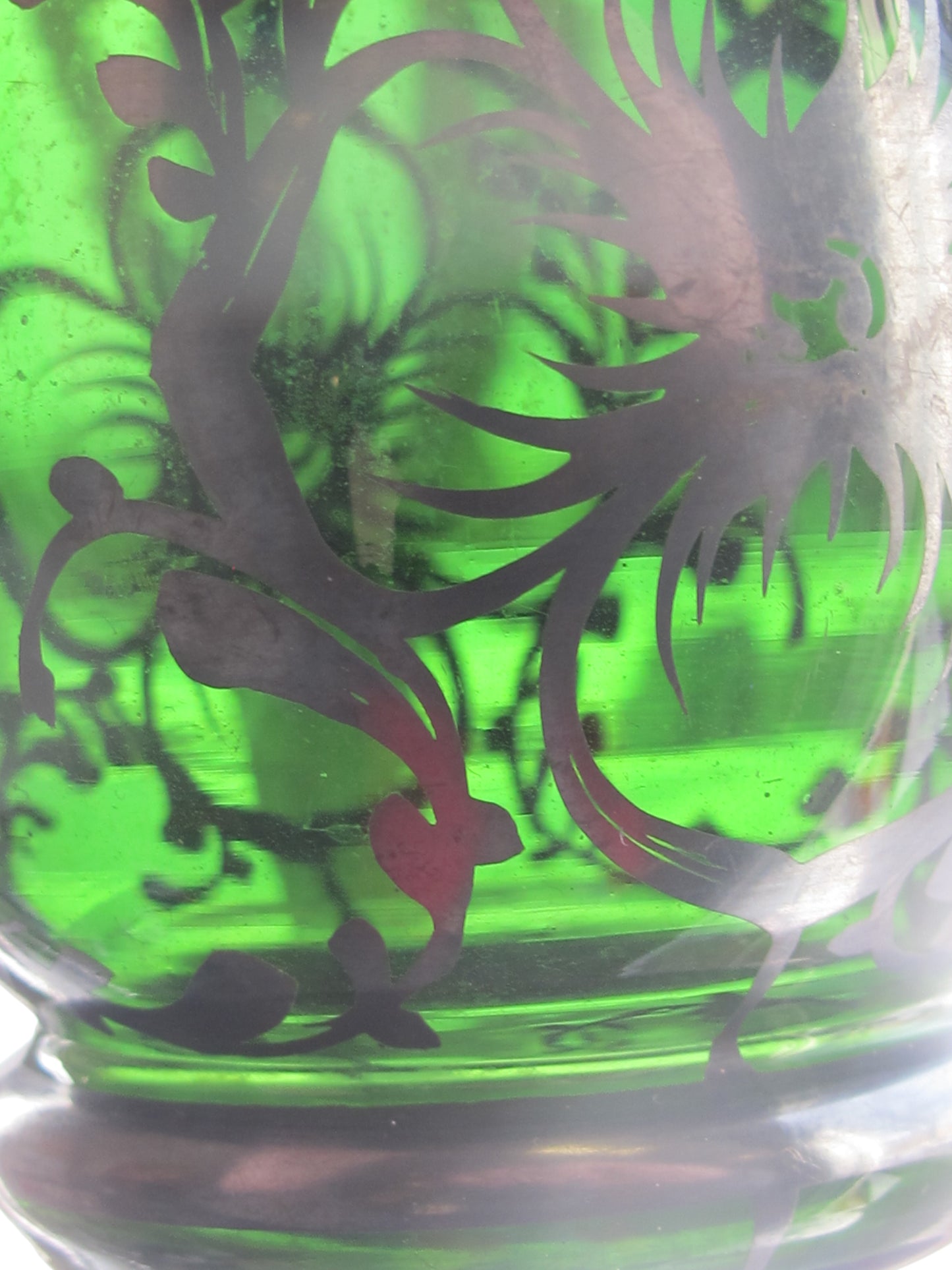 Green glass vase silver underlay